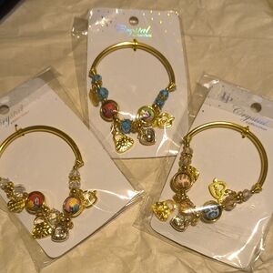Bundle Of 3 Goldtone Bangle Charm Bracelets